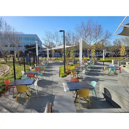 Modern Plastic Garden Patio Indoor or Outdoor Dining Stackable Chair UV Protected Armless With Dot Back Surf